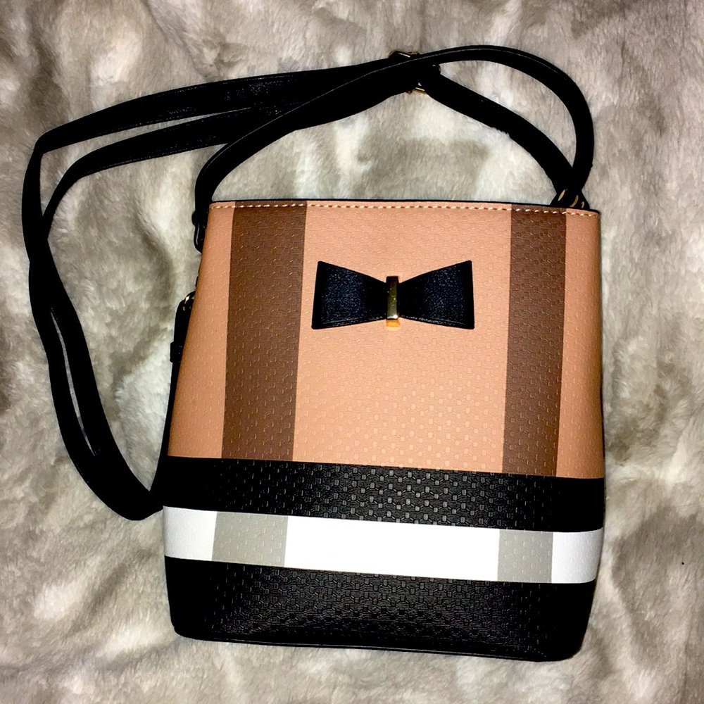 Black,tan and white purse